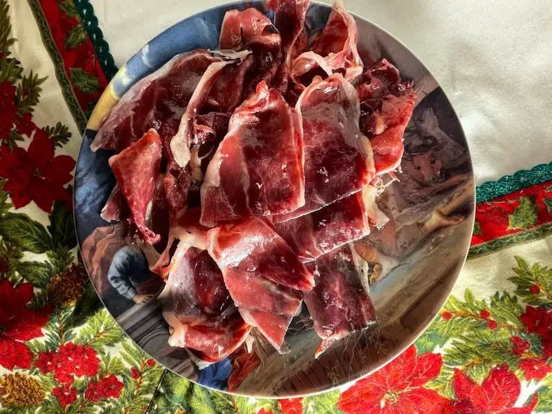 jamón ibérico plato mantel flores